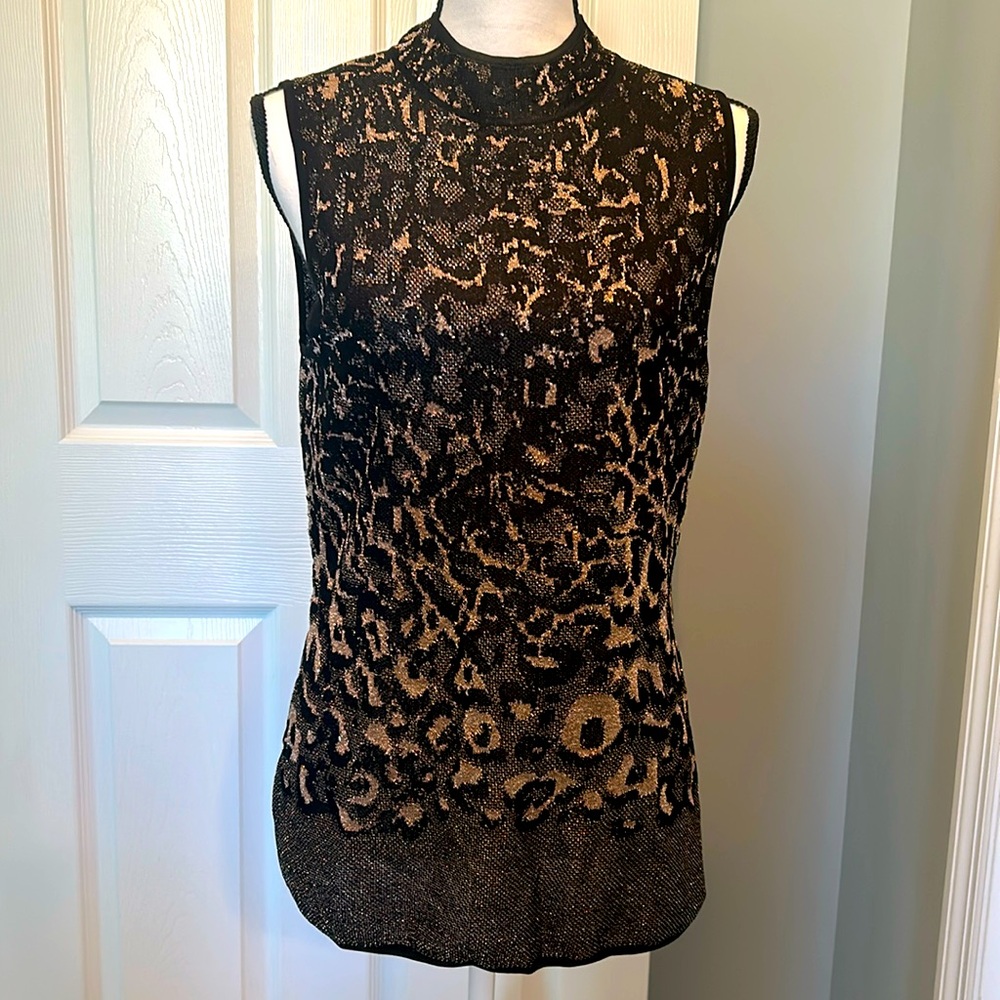 White House Black Market sleeveless sweater. Color black/brown with sparkle.